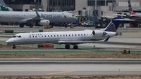 N797SK @ LAX - United Express - by Florida Metal