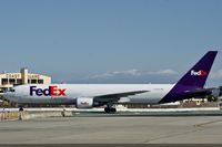 N144FE @ SFO - SFO 2019. - by Clayton Eddy