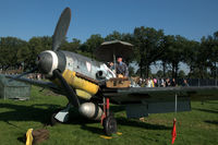 11 @ N.A. - Restored Messerschmitt Bf 109G-5 at a temporary airfield in a meadow near Ede, the Netherlands. Wings of Freedom air show, 2019. Re-enactor on the wing - by Van Propeller