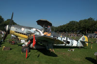 11 - Restored Messerschmitt Bf 109G-5 at a temporary airfield in a meadow near Ede, the Netherlands. Wings of Freedom air show, 2019. Re-enactor on the wing - by Van Propeller