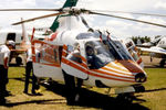 VH-DMR @ YSFS - Brand new Agusta A109A II VH-DMR Cn 7328 being viewed by visitors at the Schofields Airshow on 10Nov1985. VH-DMR was operated by the Department of Main Roads - hence the VH-DMR Registration (previously used on Bell 47J2-A helicopter Cn 3121). - by Walnaus47