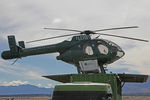 ZK-HDW @ NZWF - Stdb side view of McDonnell Douglas 500N ZK-HSH CN LN072 at Wanaka NZWF on 21Apr2014, during Warbirds Over Wanaka (WOW) 2014. The helo is equipped with spray gear, and it operated from the roof of a large Trailer. - by Walnaus47