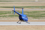 VH-LVO @ YPJT - Rear view of Blue livery Robinson R44 Raven VH-LVO Cn 2021 departing Jandakot YPJT, Perth, West Australia, on 17Nov2013. This helo, Built 2010, was First Registered in Australia on 19Apr2010. - by Walnaus47