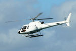 N801KF @ NZQW - Rear Portside view of USA Regd Eurocopter AS-350B-2 N801KF Cn 2789 departing Queens Wharf Heliport NZQW Wellington NZ on 14Apr2010. The helo was embarked on luxury vessel SuRi, docked there at the time. (Low Res). - by Walnaus47