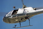 N22-016 - RAN Squirrel AS-350B helicopter N22-016 Code 863 Cn 1740, from 723 Sqn Nowra, arrives for static display in sunny conditions on the Treasury lawns, Canberra, on 17Mar1997. The occasion was Canberra Day 1997. Front-end underside view of airborne N22-016. - by Walnaus47