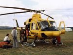 VH-NSO @ YSCB - NSCA Bell 412EP VH-NSO Cn 33089 (Code 11), with crew at the 1988 (Bi-Centennial) Canberra Air Pageant at Canberra Airport YSCB on 13Mar1988. The Bell 412 is equipped with ‘pop-out’ floats on the skids, and a personnel hoist and Nite-Sun searchlight. - by Walnaus47
