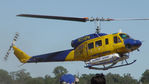 N234PH @ YBUD - Stbd view of McDermott Aviation Bell 214B-1 Biglifter N234PH Cn 28050 ‘arrival’ at Bundaberg Airshow at Bundaberg Airport YBUD on 16Jul2005. Equipped with ‘under-cabin’ water tank, with ‘pick-up’ hose retracted. - by Walnaus47