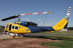 VH-SUH @ YLTV - Rear Portside view of McDermott Aviation Bell 214B-1 VH-SUH Cn 28017 HeliTack 339, taken at Latrobe Valley Airport (YLTV) Morwell on 22Feb2015. Fitted with a ‘HeliLift’ water/ fire retardant tank under the cabin. - by Walnaus47