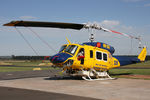 VH-SUH @ YLTV - Front Portside view of McDermott Aviation Bell 214B-1 VH-SUH Cn 28017 HeliTack 339, taken at Latrobe Valley Airport (YLTV) Morwell on 22Feb2015. Fitted with a ‘HeliLift’ water/ fire retardant tank under the cabin. - by Walnaus47