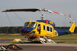VH-SUH @ YLTV - Front Portside telephoto view of McDermott Aviation Bell 214B-1 VH-SUH Cn 28017 HeliTack 339, taken at Latrobe Valley Airport (YLTV) Morwell on 22Feb2015. Fitted with a ‘HeliLift’ water/ fire retardant tank under the cabin. - by Walnaus47