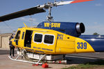 VH-SUH @ YLTV - Rear Portside view of cabin of McDermott Aviation Bell 214B-1 VH-SUH Cn 28017 HeliTack 339, at Latrobe Valley Airport (YLTV) Morwell on 22Feb2015. Fitted with a ‘HeliLift’ water/ fire retardant tank under the cabin. - by Walnaus47