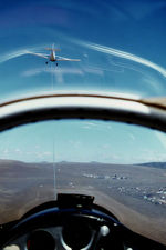 VH-GCG @ YPFT - Airborne forward view from Canberra Gliding Club Blanik L-13 VH-GCG Cn 025424 airborne at Polo Flat YPFT (at Cooma NSW) on 30Mar1980. The Blanik is being towed aloft by Canberra Gliding Club Piper PA-25-235 Pawnee B VH-MLS Cn 25-3809. - by Walnaus47