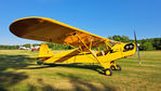 CF-NGQ @ CPJ5 - 1945 Piper J3 Cub on grass at Stirling airport, Ontario, Canada - by Dave Carnahan