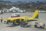 J8-VBI @ TGPY - Being unloaded at Grenada Airport - by Chris Holtby