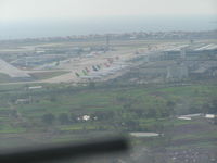 - South ramp at LTBA/IST. Cargo ramp in center of photo,main terminal at right, rwy 24 just off left side. - by John J. Boling