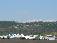  - Sierra Nevada behind an approaching plane into Placerville. - by Discombobulato