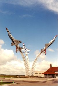  - Three T-38's in Thunderbird paint, acquired with help from the US Navy, on display at the now closed Heritage Halls, just north of the airport and south of Cabella's - by Timothy Aanerud