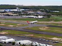  @ Cairns International Airport - View from the adjacent Mountain park - by Terry Fletcher