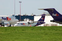  - Fed Ex fleet at YVR summer 2007 - by metricbolt