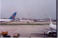  - China Eastern A320 taxiing past China Southern B777 and Air China B737,Beijing,Aug.2005 - by metricbolt