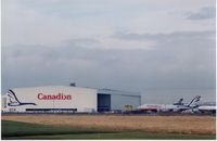  - CAIL B747 Proud Wings and DC-10s outside the hangar before the Air Canada takeover. - by metricbolt