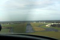  - short finals for Kemble - note Brstol Britannia parked on the left - by Pete Hughes