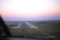  - Approaching to land Runway 9 in an Apache, I'm just riding along - by Glenn E. Chatfield