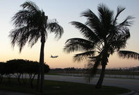  - All the photographers have gone from the fence , as a FedEX DC10 arrives MIA just before nightfall - by Terry Fletcher