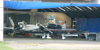  - Hangar Area at Lashenden/Headcorn UK (G-BCID - left & G-KENW - right) - by Jeff Sexton