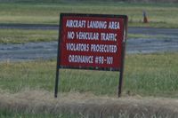  - Don't drive over the runway! - by Timothy Aanerud