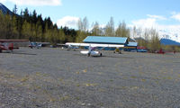  @ Girdwood Airport - Looking on the North parking apron and Alpine Air helicopter facility - by Terry Fletcher