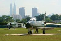  - CAC Sabre from RMAF Museum at RMAF Kuala Lumpur-Sungai Besi with the Petronias Towers in the background - by Michel Teiten ( www.mablehome.com )