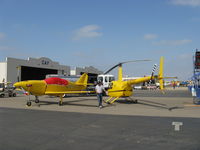  - Yellow Toys for Big Boys at EAA Annual Airshow - by Doug Robertson