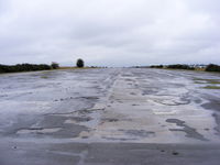  - Looking southwest down runway 22 - by chris hall