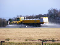  - Spraying deicer on the runway  - by chris hall