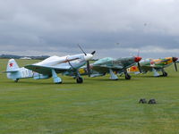  - Beautiful line of Yak-fighters waiting for the action at the Legends 2009 - by Alex Smit