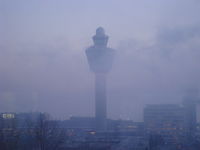  - Schiphol Airport with Fog - by Caecilia van der Bos
