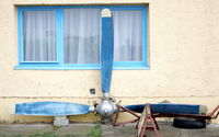  - The wall of the hangar decorator V-509A-D9 type propeller. - by Attila Groszvald-Groszi