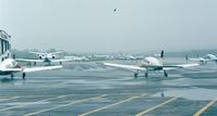  - Groton-New London airport apron on a rainy day - by Ingo Warnecke