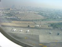  - Taking off from Dubäi Airport. Can see Dubai in the background. - by Erdinç Toklu