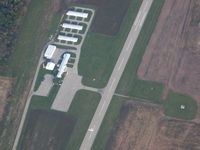  @ Hillsdale Municipal Airport - View of the facilities and and aircraft departing to the west. - by Bob Simmermon