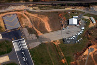  - On the NE side of the airport; on the right you can see the Carolinas Aviation Museum. - by Jamin