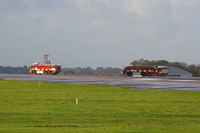  - Manchester Airport fire crews following Thomas Cook Boeing 757 G-FCLK down the runway, which made an emergency landing on one engine after an engine fire - by Chris Hall