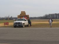  - Mulching hay over completed construction.  Maybe they're just talking about it. - by Bob Simmermon