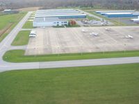  - Departing RWY 15 looking SW at the FBO. - by Bob Simmermon