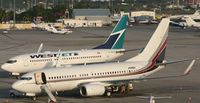 - 737 side by side at TNCM - by SHEEP GANG