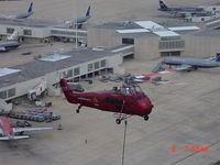  - vintage Sikorsky lifting a new X band radar to the top of ATCT - by Jeff MacManus