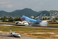  @ Princess Juliana International Airport - Landing with smoke - by Wolfgang Zilske