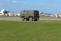  - Transient activity and a NATO personnel carrier during Sun N Fun week - by Bob Simmermon
