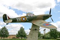  - Supermarine 349 Spitfire F5 (replica) BM361 / XR-C in the commemorative area at RAF Lakenheath. Painted in the colours of 71 Eagle Sqn, a touching tribute to Fighter Command from the USAF's 48th Fighter Wing. - by Malcolm Clarke